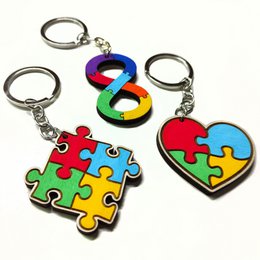Colorful Rubik's cube keychain with a mix of vibrant colors and a classic puzzle design, perfect for geeks and nerds.