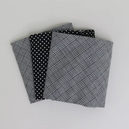 Grey and black patterned handkerchiefs, suitable for formal or casual wear. Made of high-quality cotton material.