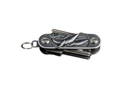 A compact, multi-functional key organizer made of durable metal with various tools and attachments for everyday use.