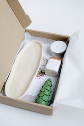 Christmas Giftbox with house, tree and candle