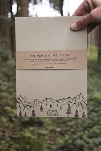 Grass paper notepad camper in the mountains
