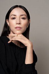 Triangular stud earrings in a modern, minimalist design.