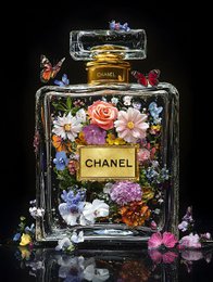 # Product Description
Luxury perfume bottle with vibrant multicolored flowers, gold accents, elegant glass design, artistic floral arrangement.