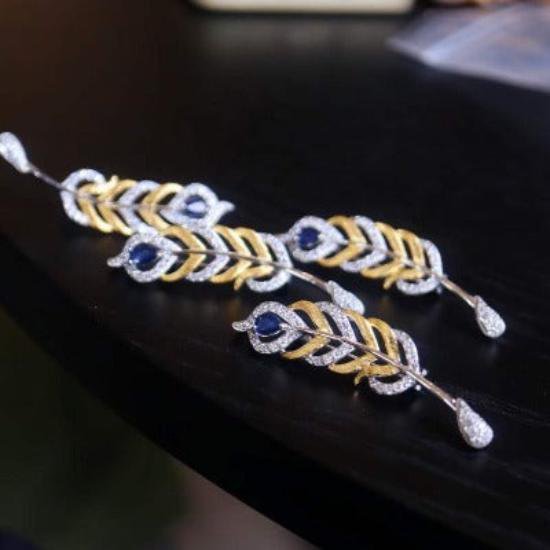 Broche de zafiro con esplendor emplumado