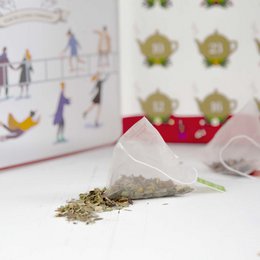 ETS - Teebuch Tee Adventskalender mit Schleife "Wellness", 25 Boxen mit BIO-Tee in hochwertigen Pyramiden