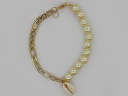 %2376 Cowrie shell pearl bracelet