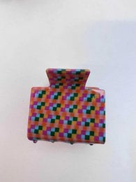 Colorful geometric patterned hair clips, square shape, multicolor checkered design, vibrant pink purple blue red.