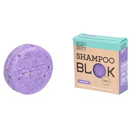 Lavender shampoo bar with a round, solid shape and a floral scent.