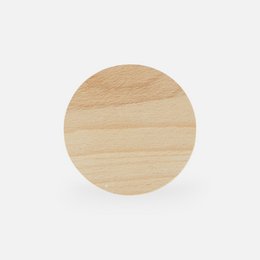  Wooden round coaster with natural wood grain texture.