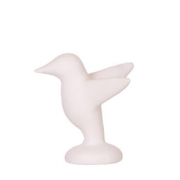 A white ceramic bird statue with a simple, minimalist design. The bird has a rounded, abstract shape and appears to be in a flying or hovering pose.