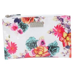 A large, flat cosmetic bag with a vibrant floral print in shades of pink, red, and green. The bag features a zipper closure and a detachable wrist strap for easy carrying.