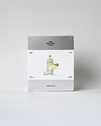 Giftset containing a bottle of non-alcoholic mocktail mixer and a glass.