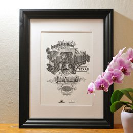 Vintage-style letterpress poster featuring the text "San Antonio, Texas" with decorative elements. The poster has a black and white, engraved or etched appearance.
