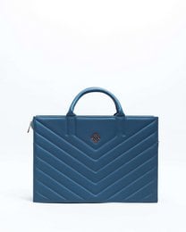 Off-white leather business bag with chevron quilted pattern and metal hardware.