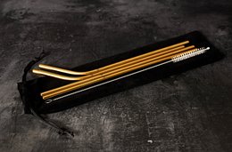 Set mit 4 goldenen Strohhalmen