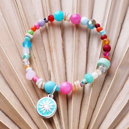 Colorful beaded bracelet with round multicolor stones, silver charm pendant featuring lemon slice design.