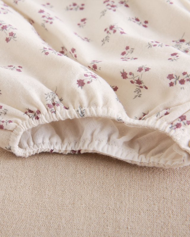 Rompertje met bloemenprint voor babymeisjes met pompondetail P72-11604042