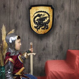 Jouet en bois dragon bouclier héraldique
