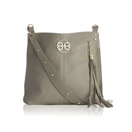 Taupe leather shoulder bag with a stylish metal emblem and tassel detail.