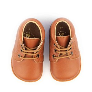Brown leather baby boots