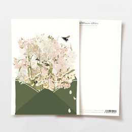 Postcard envelope with delicate white flowers, FSC certified.