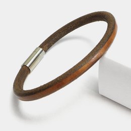 Men's leather bracelet with a star design, available in sizes S, M, L, XL.