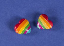 Colorful rainbow-patterned heart-shaped soapstone statues.