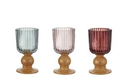 A set of 3 glass candle holders in assorted colors, including green, pink, and red. The holders have a ribbed texture and are mounted on wooden bases, creating a rustic and elegant design.