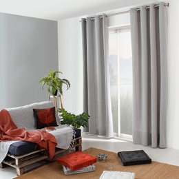 Mottled textured curtains with eyelets, neutral gray and cream colors, modern minimalist style, light filtering window drapes.