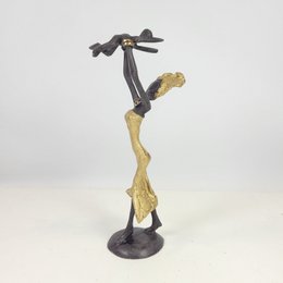 Scultura in bronzo "Baby in the air" di Soré | diverse dimensioni e colori
