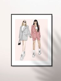 The image shows two fashionable women wearing stylish outfits. The woman on the left is wearing a gray oversized blazer, while the woman on the right is wearing a pink suit. Both women are wearing sneakers and sunglasses, giving the image a casual yet chic vibe.