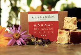 Nougat des toits de Paris, a sweet confection made with strawberries, nuts, and a delicate texture.
