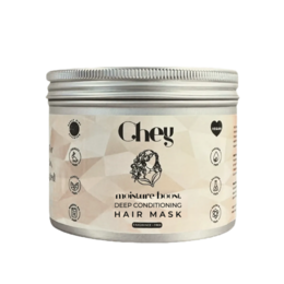 Protein-enriched hair mask in a white jar with a silver lid. Designed to nourish and strengthen hair.