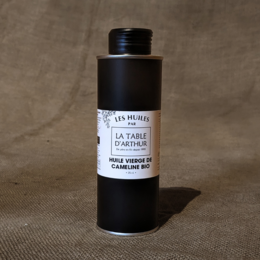 100% Local Organic Camelina Virgin Oil, a high-quality vegetable oil with a rich, nutty flavor.