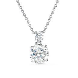 Elegant silver-toned charm necklace with a sparkling crystal pendant. Suitable for formal or casual wear.