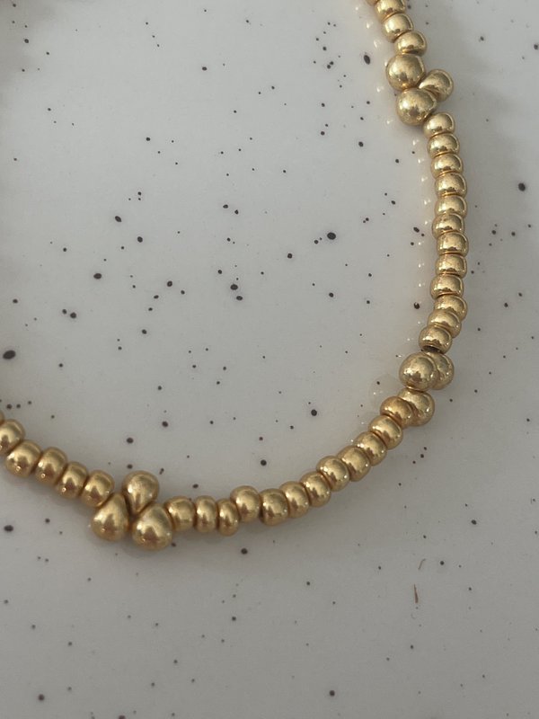 Armbånd dråber guld