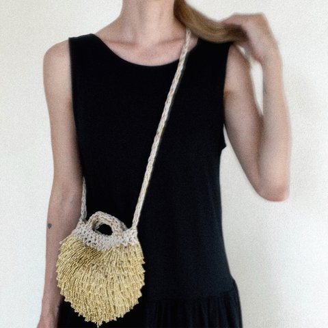 “Pebble metallic” handcrafted clutch with crossbody strap gold