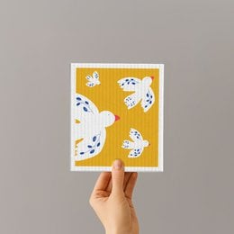 Absorbent kitchen sponge with a playful bird pattern in shades of yellow and white.
