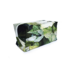 Waterproof cosmetic travel pouch with forest leaf print. Made of durable material, ideal for storing and organizing makeup, toiletries, and other small items during travel.