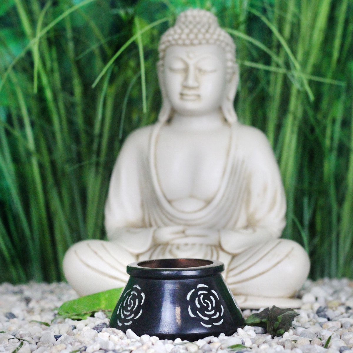 Tea light holder made of soapstone including tea light