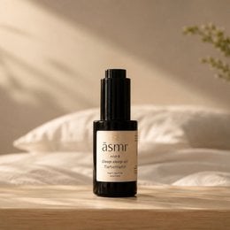 Deep Sleep Oil, essential oil in black bottle with white label