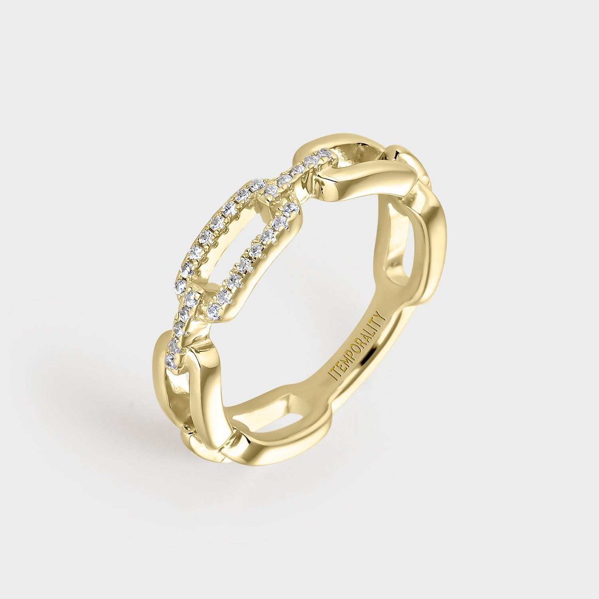 Ring with rectangular links united in gold-plated silver