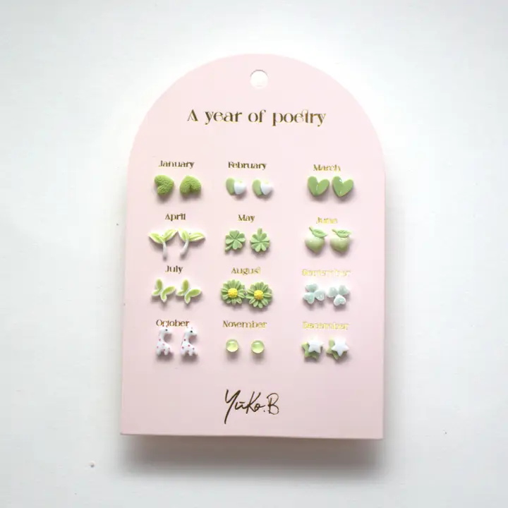 Box of 12 Ceramic Earrings — A Year of Green Poetry - English