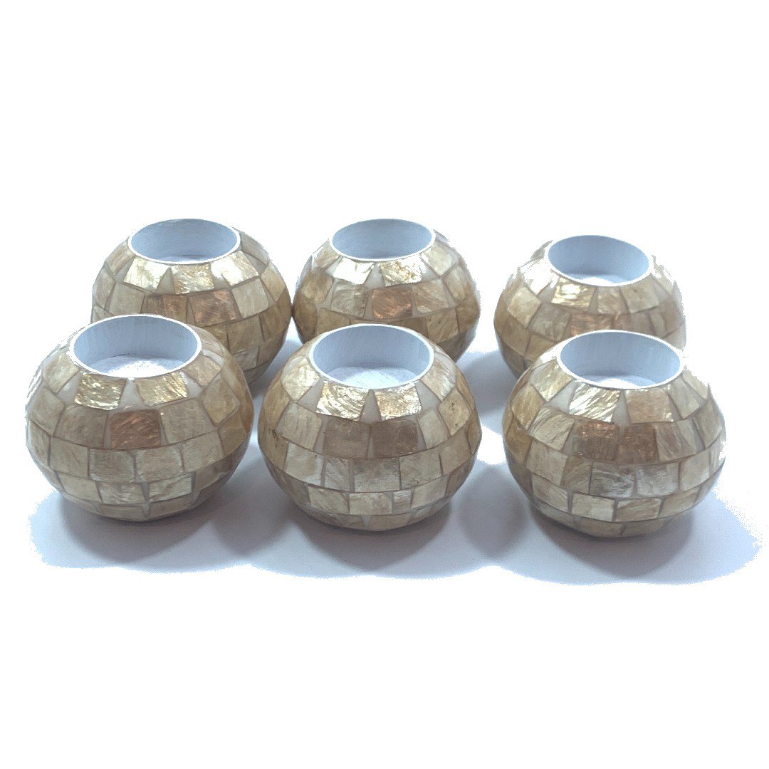 Set of gold shell tea light holders