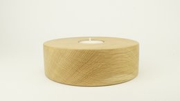 Cylindrical tealight holder made of oak, walnut, or black walnut wood. Minimalist, natural design suitable for home decor.