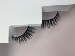 Vegan Lavida lashes, a pair of long, dramatic false eyelashes made with cruelty-free materials. These lashes feature a natural, wispy look that can enhance and open up the eyes.