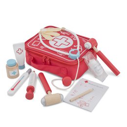 A red doctor's kit containing various medical tools and accessories, including a stethoscope, syringes, bandages, and other medical supplies. The kit is designed for children to engage in imaginative play.