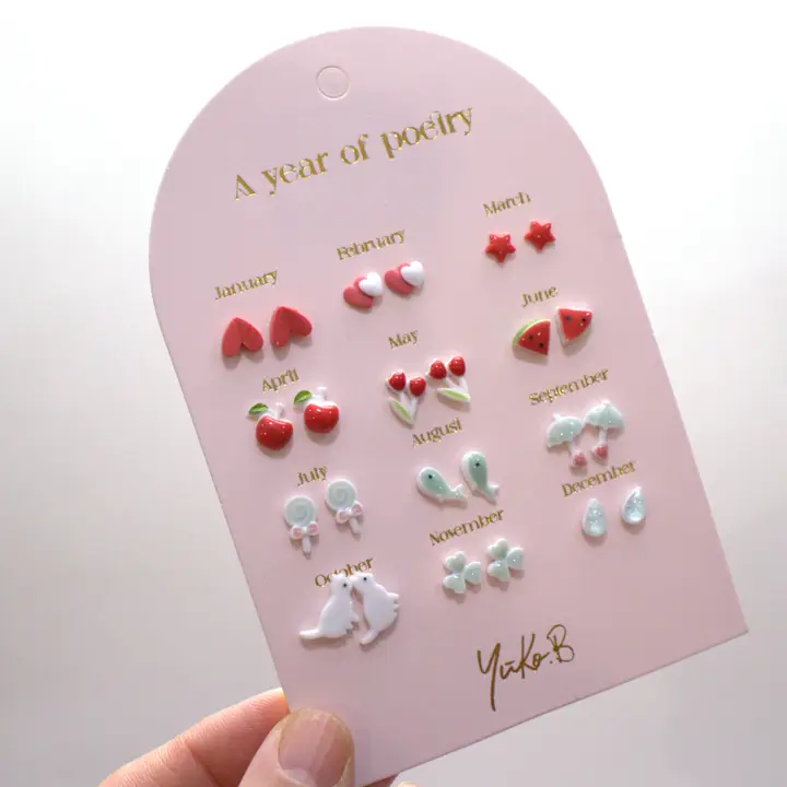 Card of 12 Earrings A Year of Poetry red English