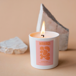 Fragrant candle in a glass container with a wooden wick and cotton wax. Features notes of tobacco, honey, and tonka.
