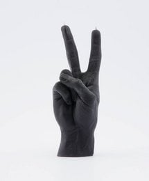 Black candle in a peace sign shape, suitable for dinner table decor.